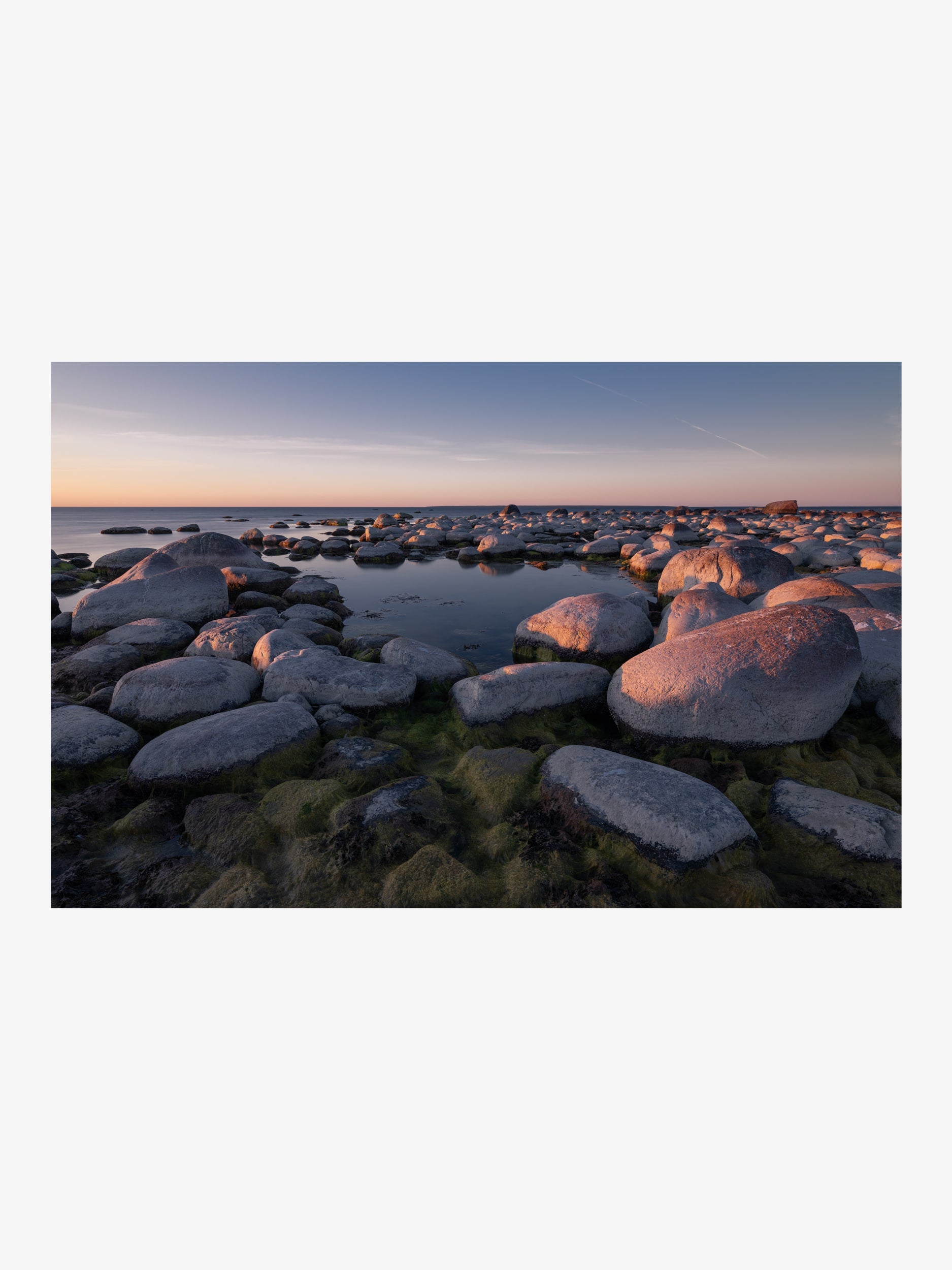 Sunset Sea with Rocks in Soft Golden Light