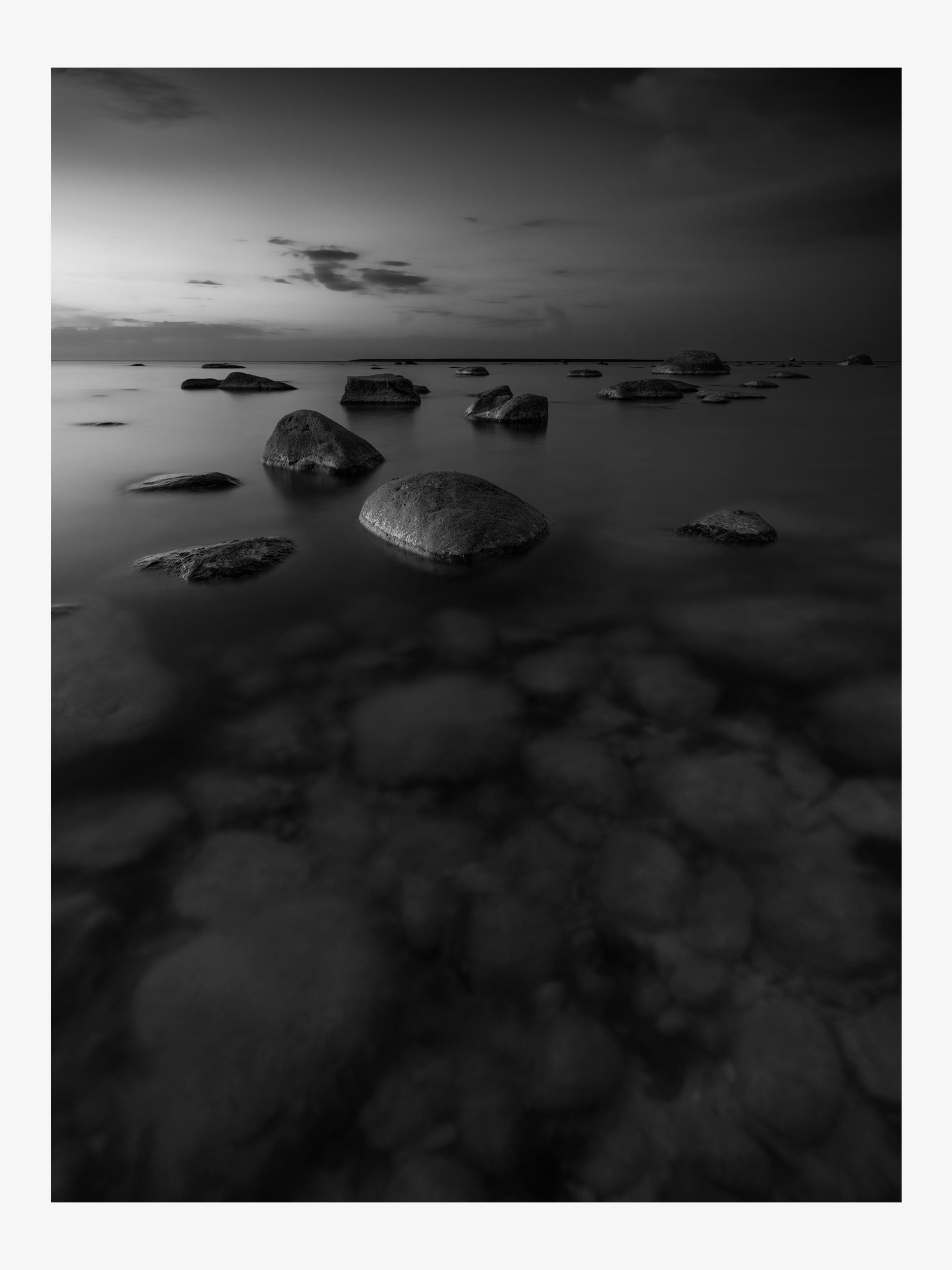 Black and White Seascape with Rocks at Sunset