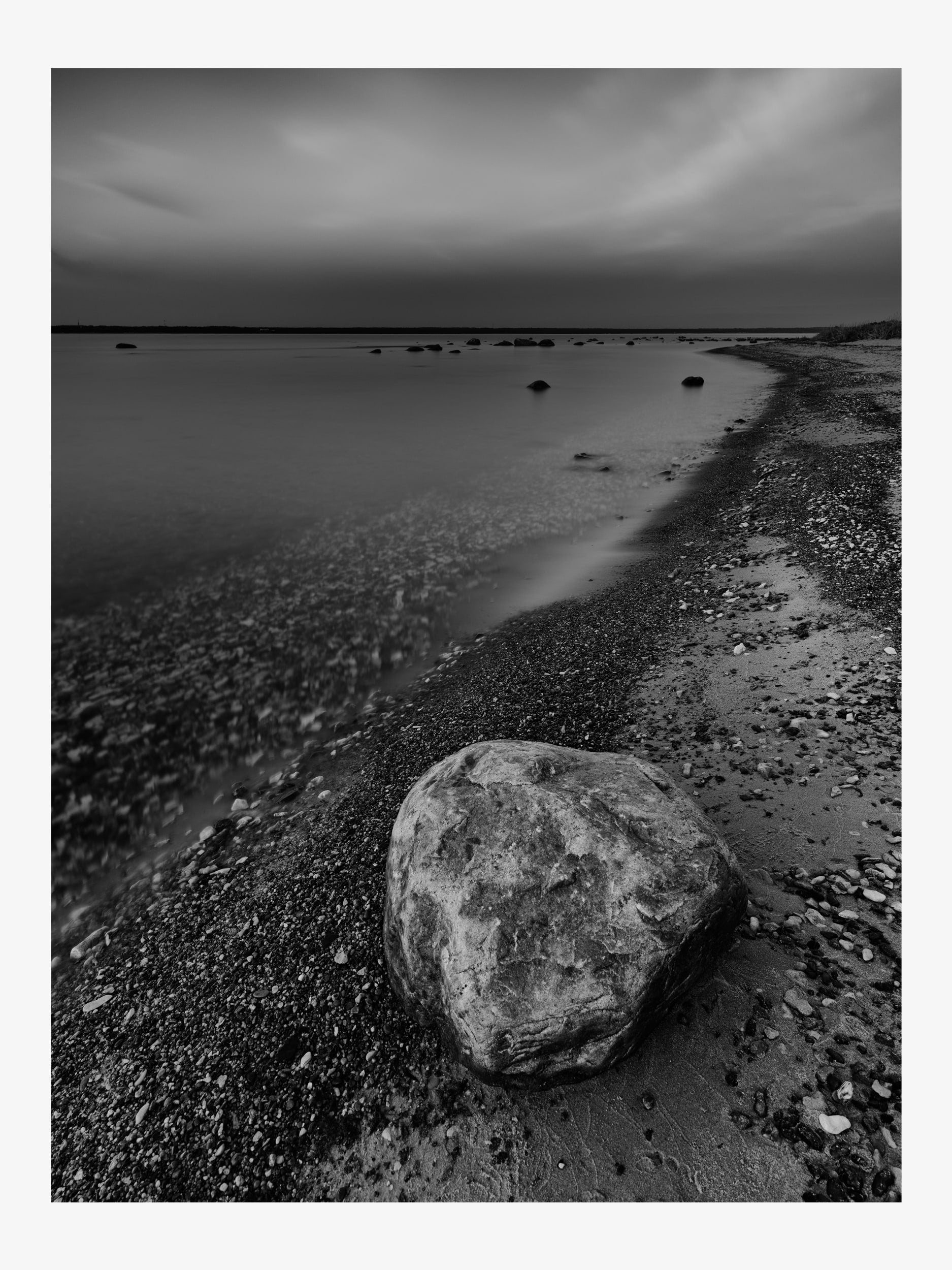 Black and White Seascape with Rock on the Shore