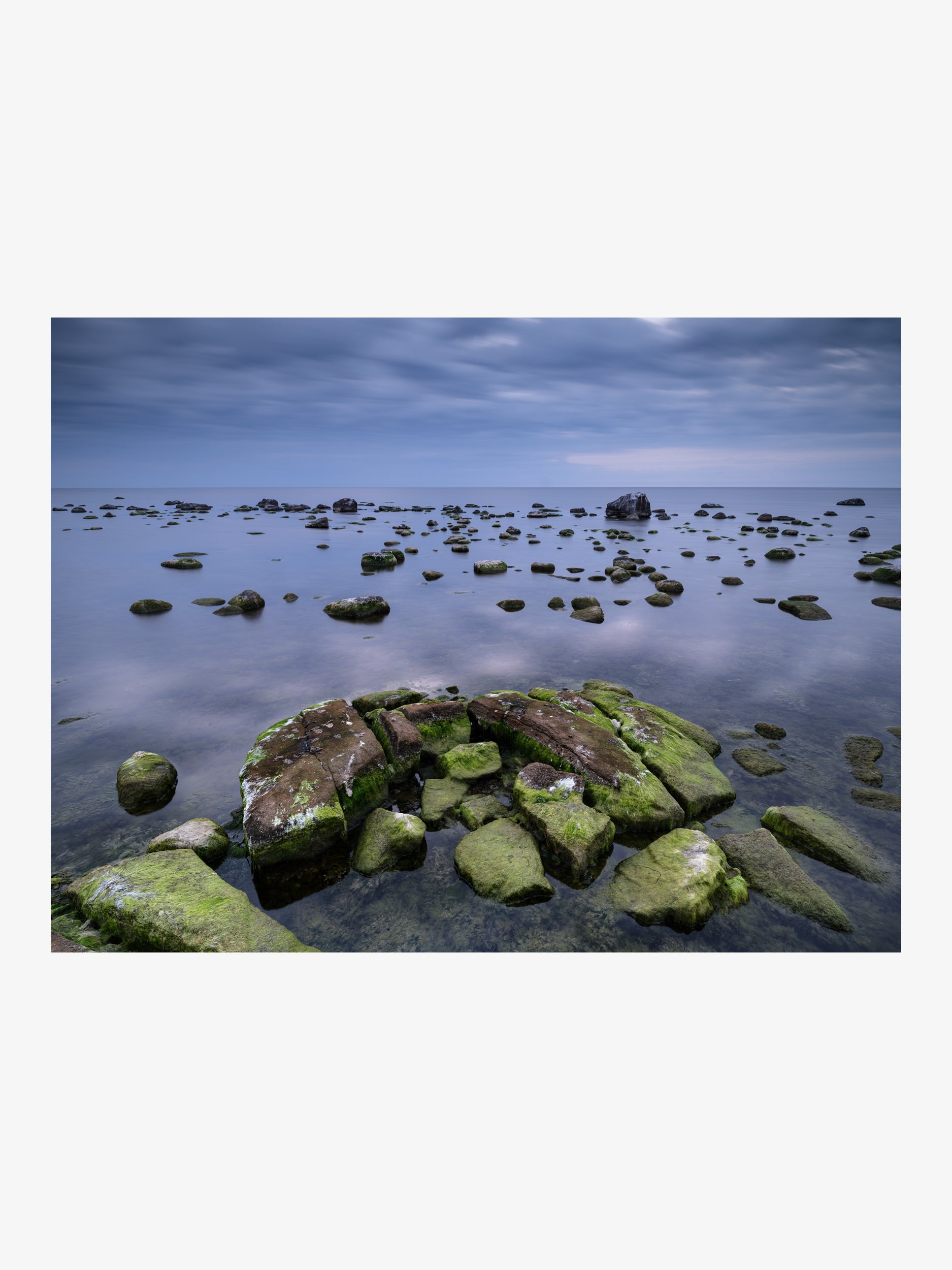 Baltic Shore – Stones Beneath the Clouded Sky Fine Art Print