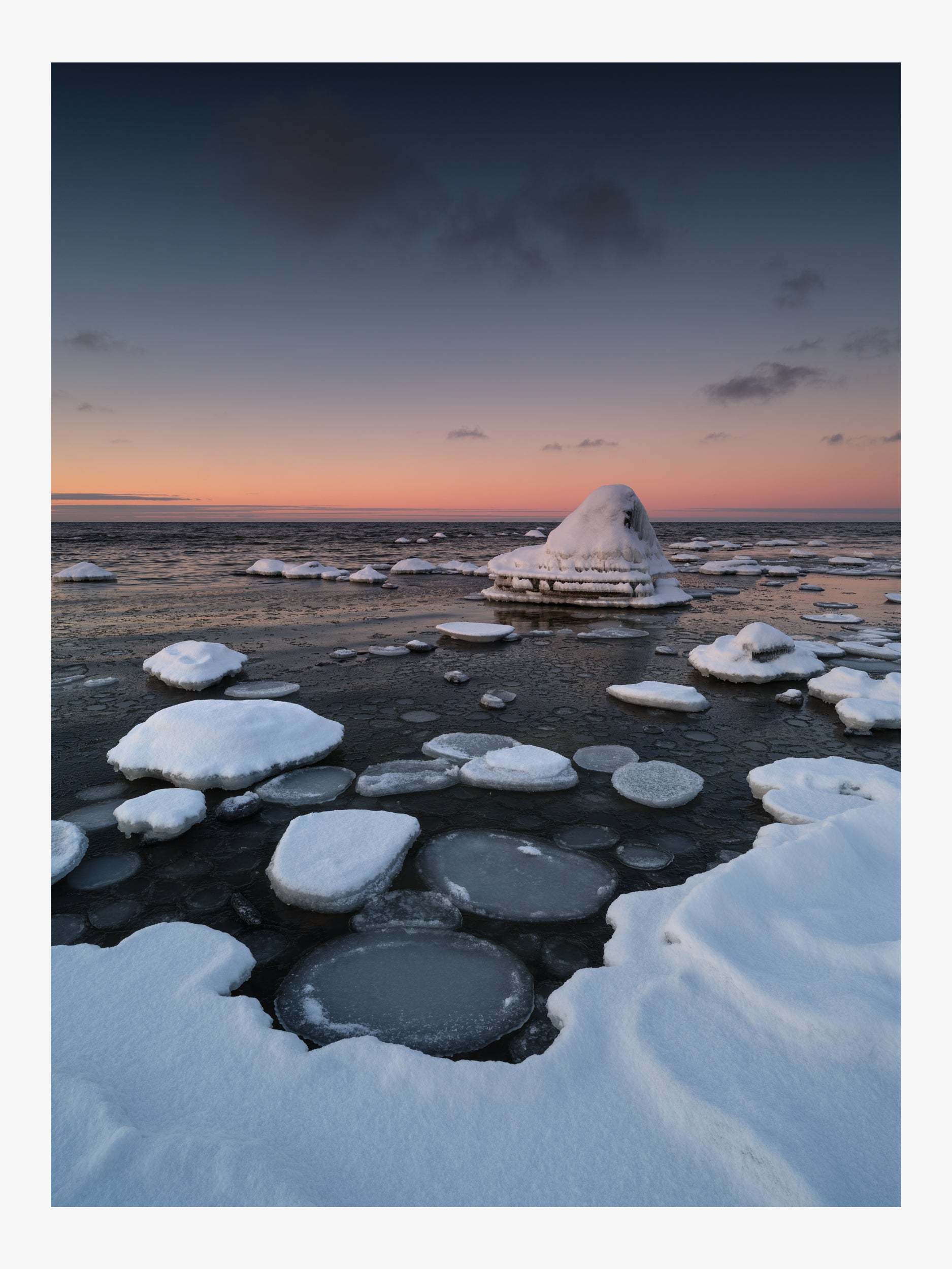 Winter Sea with an Icy Boulder