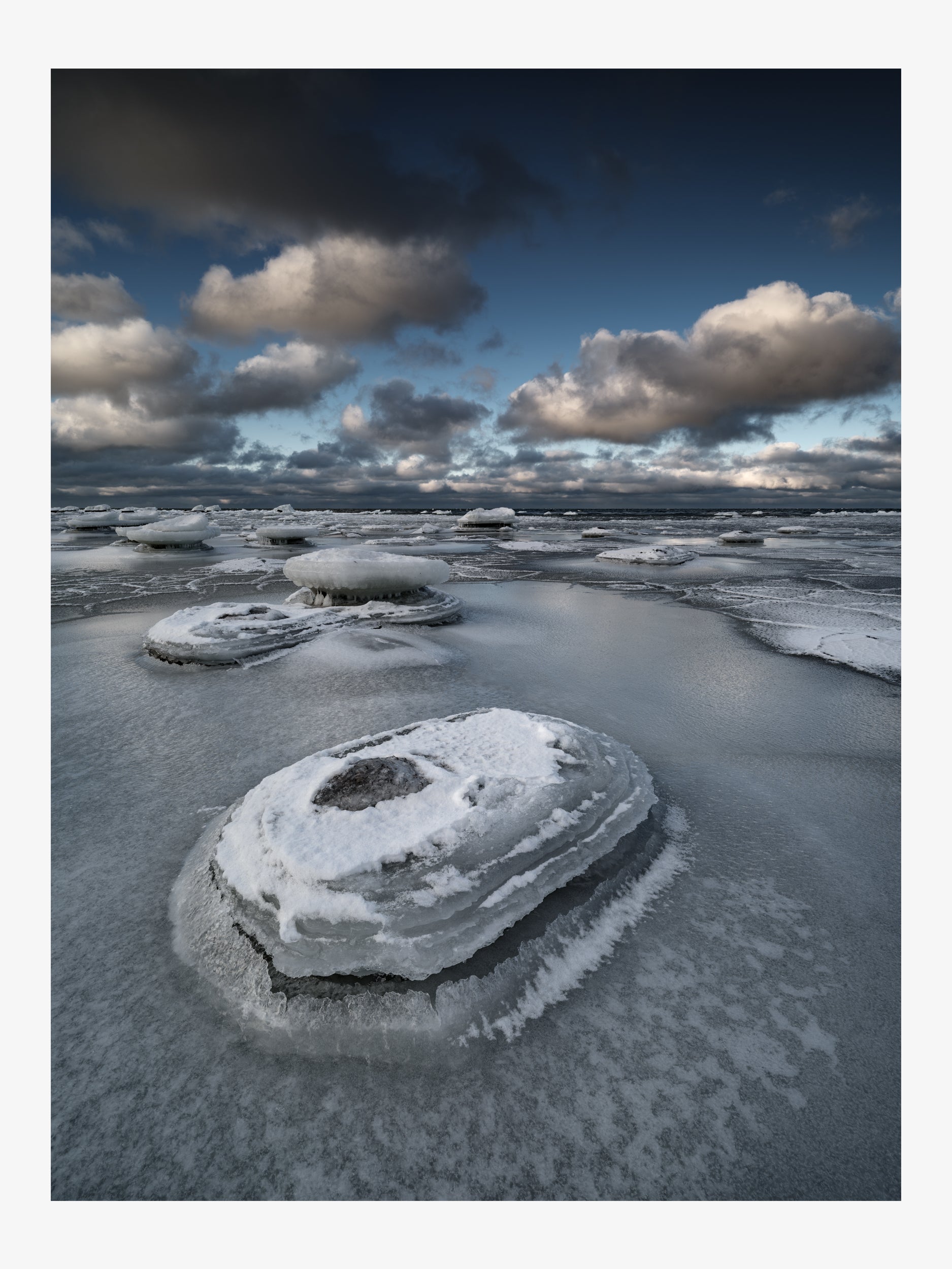 Ice-Covered Rocks in the Winter Sea